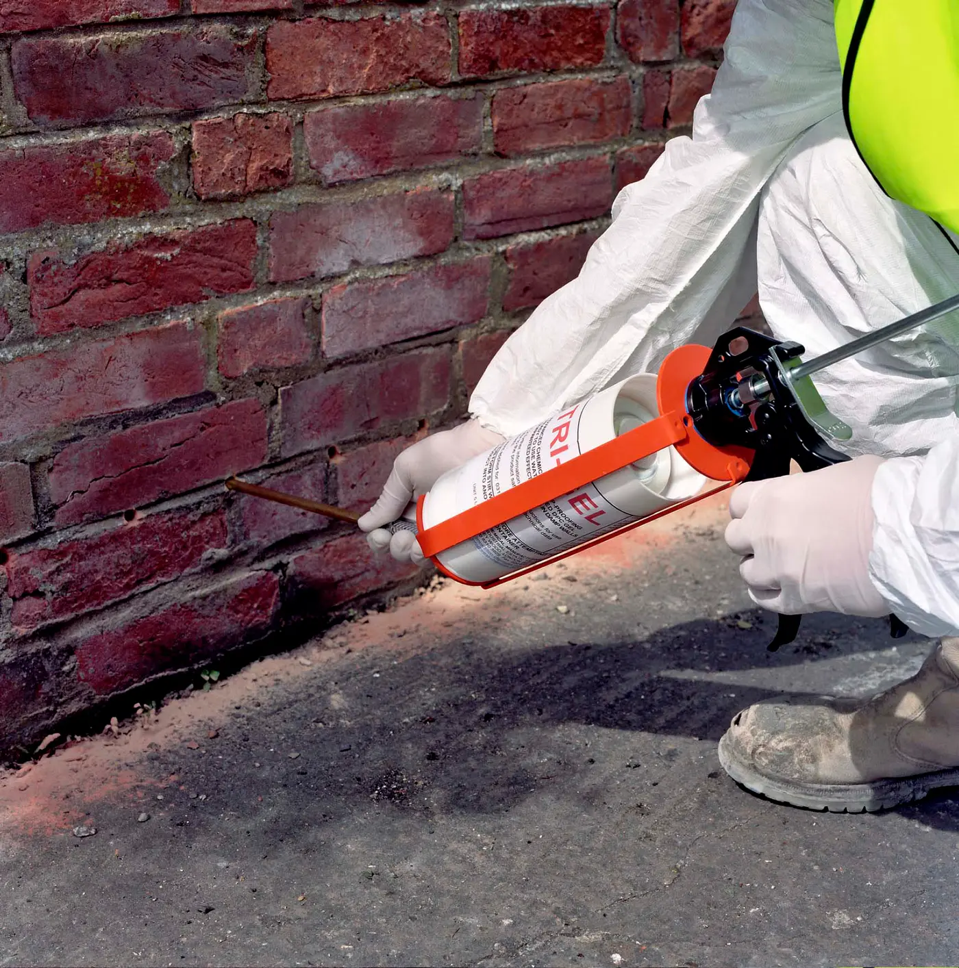 Treating a wall for rising damp